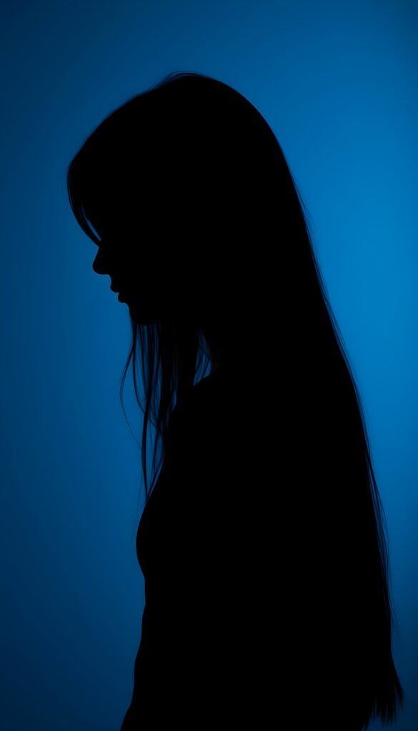A (((black silhouette of a young girl with long straight hair))), perfect curved female figure, all against a deep blue backdrop, side view.