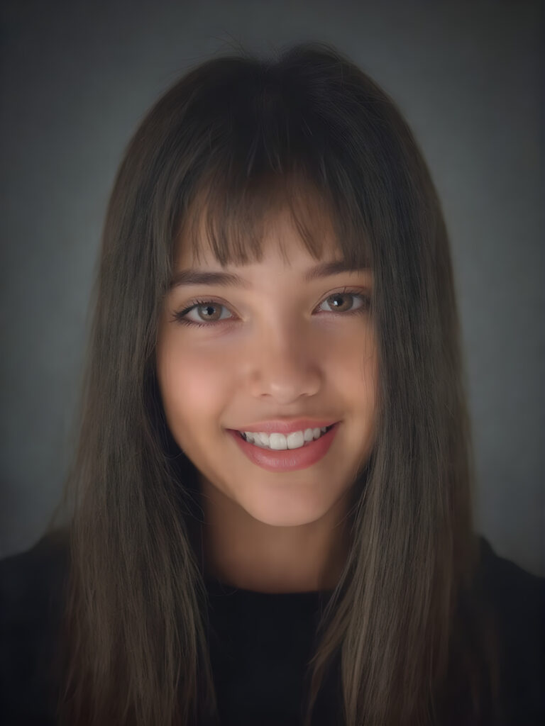 super realistic, 4k, detailed and round face, cute teen girl, super realistic and detailed long straight black hair like steel, styled bangs, looks at the camera, (centered portrait shot), smile very happy, she has detailed amber eyes and eyeliner, perfect body, full red lips, perfect skin, warm smile open mouth and white teeth, all against a grey backdrop